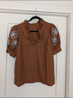entro Rust Ruffle V-Neck Puff Sleeve Blouse with Blue Floral Embroidery